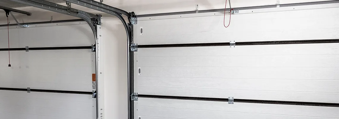 Fix Folding Garage Door Jerking in Burnaby, British Columbia